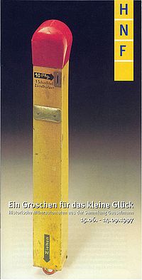 Ein Automat für Zündhözer in Form eines großen Zündholzes